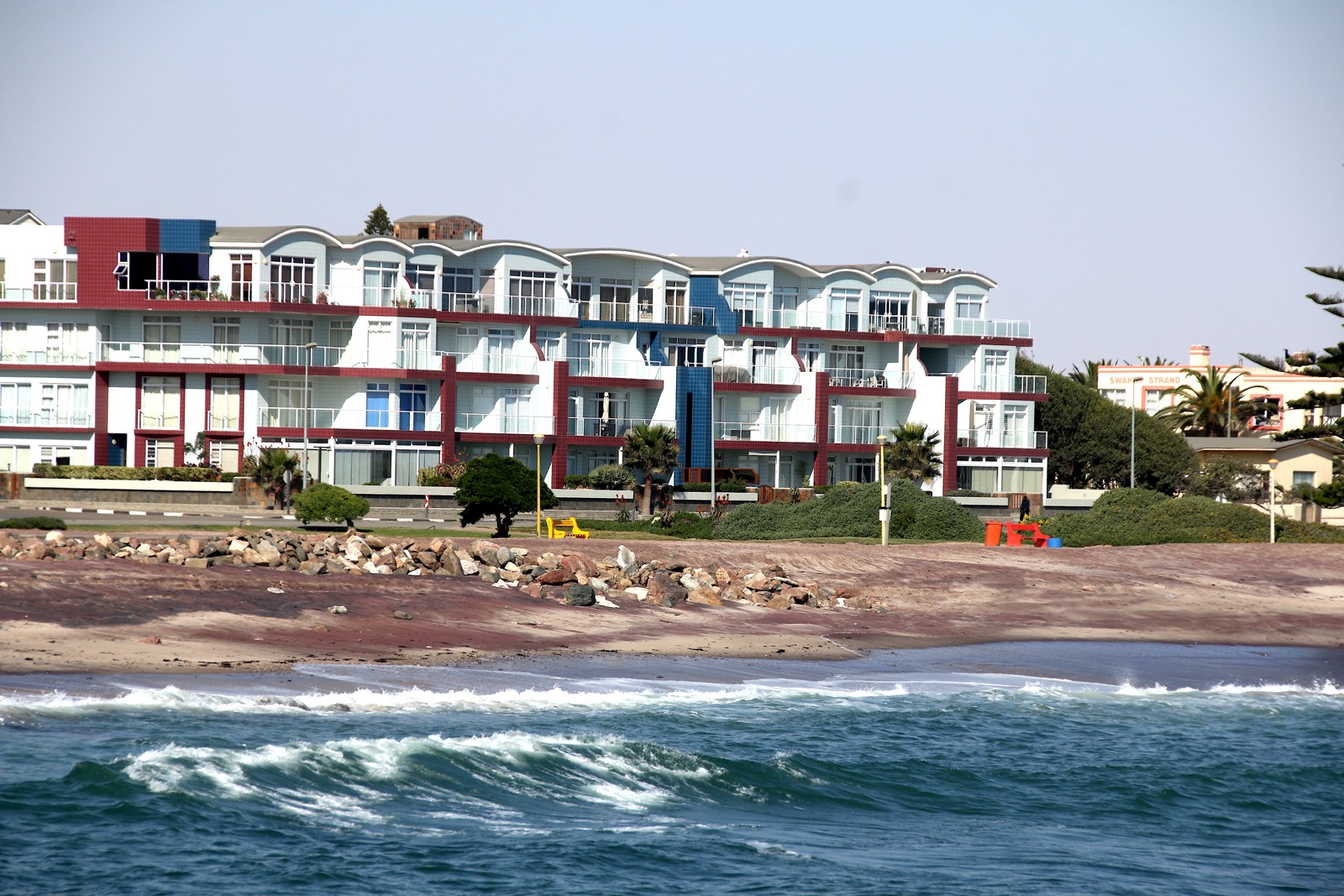 Swakopmund seafront viewed from the jetty, June 2022. No claim about current businesses.